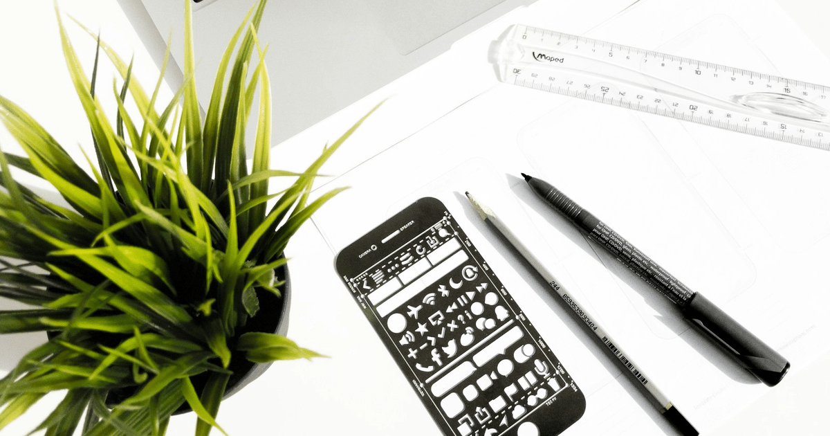 Laptop showing a web design pricing calculator with British pound figures